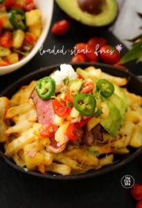 We took these loaded steak fries to the next level, topped with gooey, melted cheese and layered with pineapple Pico De Gallo and of course, with smokin’ juicy steak.