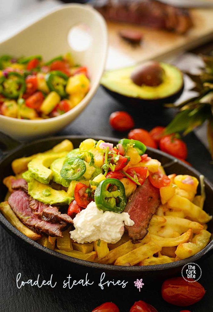 We took these loaded steak fries to the next level, topped with gooey, melted cheese and layered with pineapple Pico De Gallo and of course, with smokin’ juicy steak.