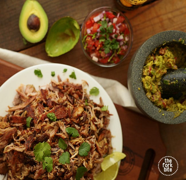 The best slow cooker carnitas recipe that brings out the flavor and retains the moisture while keeping the meat super juicy when stored.