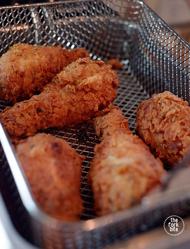 Carefully flip the chicken pieces with tongs and cook until the second side is golden brown, about 4 minutes longer.