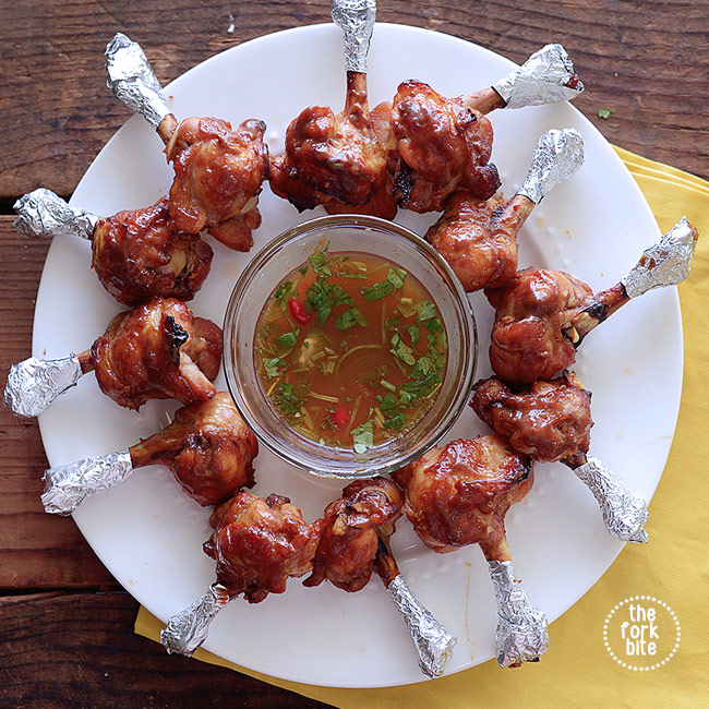 These baked chicken lollipop appetizers are perfect finger food and are shaped like a lollipop. Marinated with hoisin ginger and baked to juicy deliciousness.