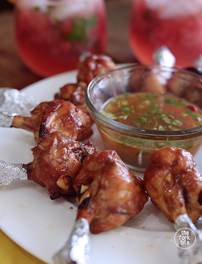 These baked chicken lollipop appetizers are perfect finger food and are shaped like a lollipop. Marinated with hoisin ginger and baked to juicy deliciousness.