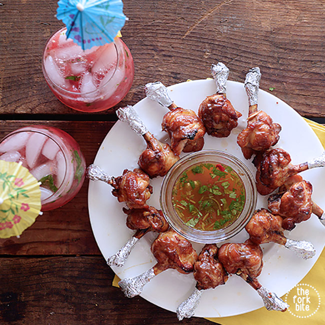 These baked chicken lollipop appetizers are perfect finger food and are shaped like a lollipop. Marinated with hoisin ginger and baked to juicy deliciousness.