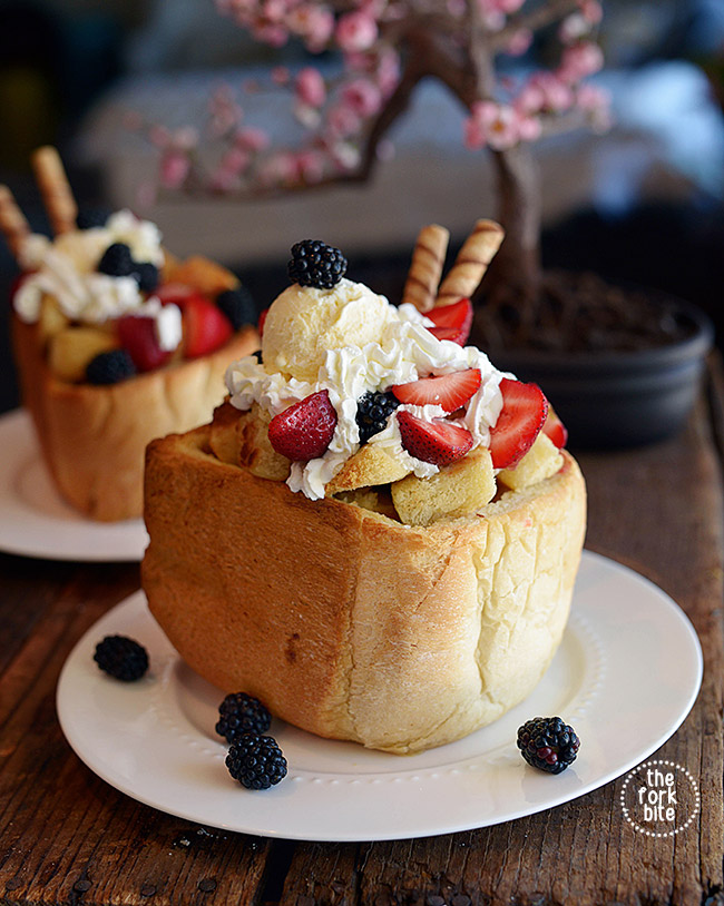 Cut the squares you cut from the bread into even smaller squares. Whisk together butter, sugar, and vanilla until mixed well and spread on all sides of the bread squares and the inside and top of the bread frames you created. Bake in a preheated 360-degree oven until golden brown.