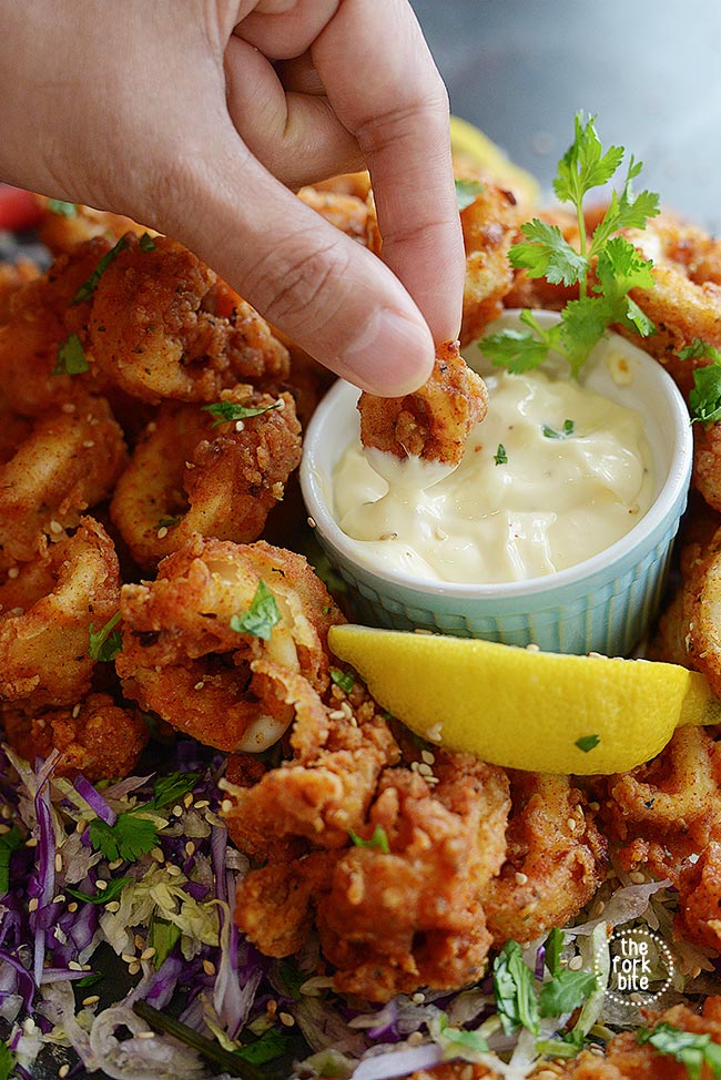 This is the best Fried Calamari Recipe ever, they are tender in the inside and crispy fried to golden brown perfection.