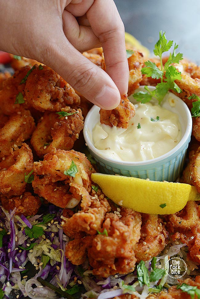 This is the best Fried Calamari Recipe ever, they are tender in the inside and crispy fried to golden brown perfection.