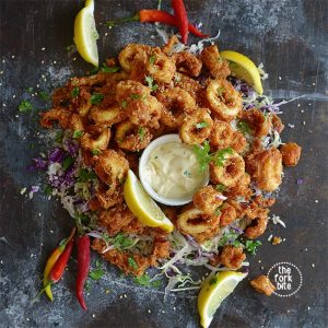 This is the best Fried Calamari Recipe ever, they are tender in the inside and crispy fried to golden brown perfection.