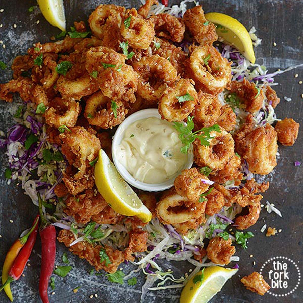 This is the best Fried Calamari Recipe ever, they are tender in the inside and crispy fried to golden brown perfection.