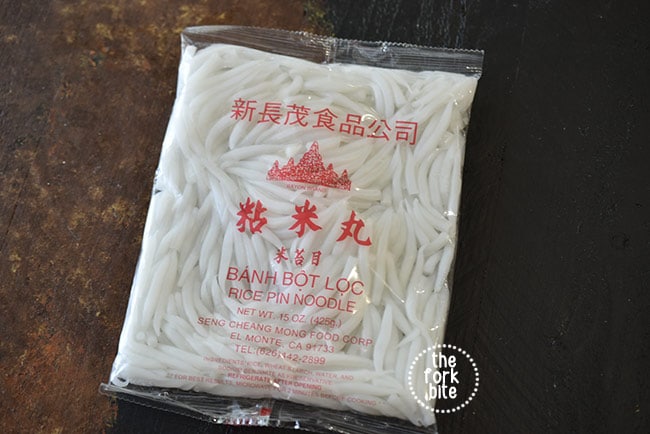 The noodles are slightly thicker translucent rice noodles. If you're lucky enough to have an Asian market near you, you'll find these sold as silver needle noodles.