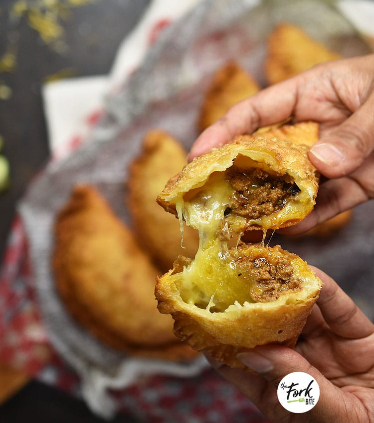 Empanadas Recipe - These delectable little pockets of yummy-ness can start a family tradition that your kids will remember forever.