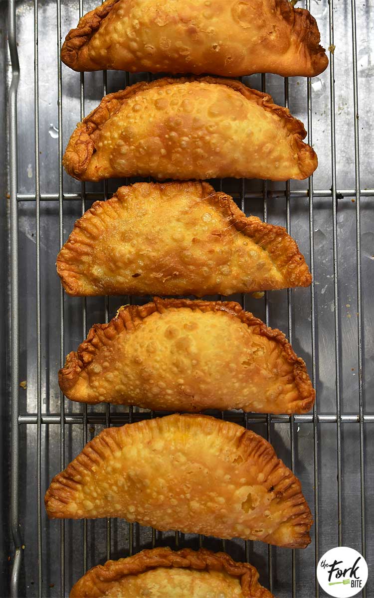 Empanadas Recipe - These delectable little pockets of yummy-ness can start a family tradition that your kids will remember forever.