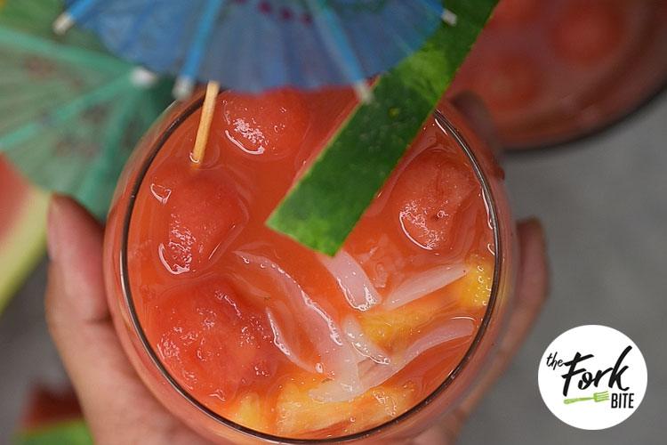 pour the mixture over crushed or slushed ice, before I add the water and then add it as needed. You can serve this watermelon lemonade with a sprig of mint for an even more refreshing flavor.