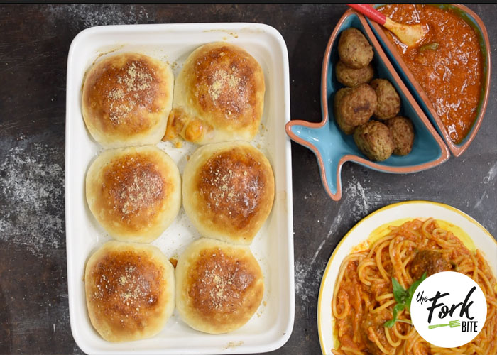 These Pizza Bombs are stuffed with meatball, bacon, spaghetti sauce and cheese, then wrapped in dough. They are quick to make and have so much flavor.