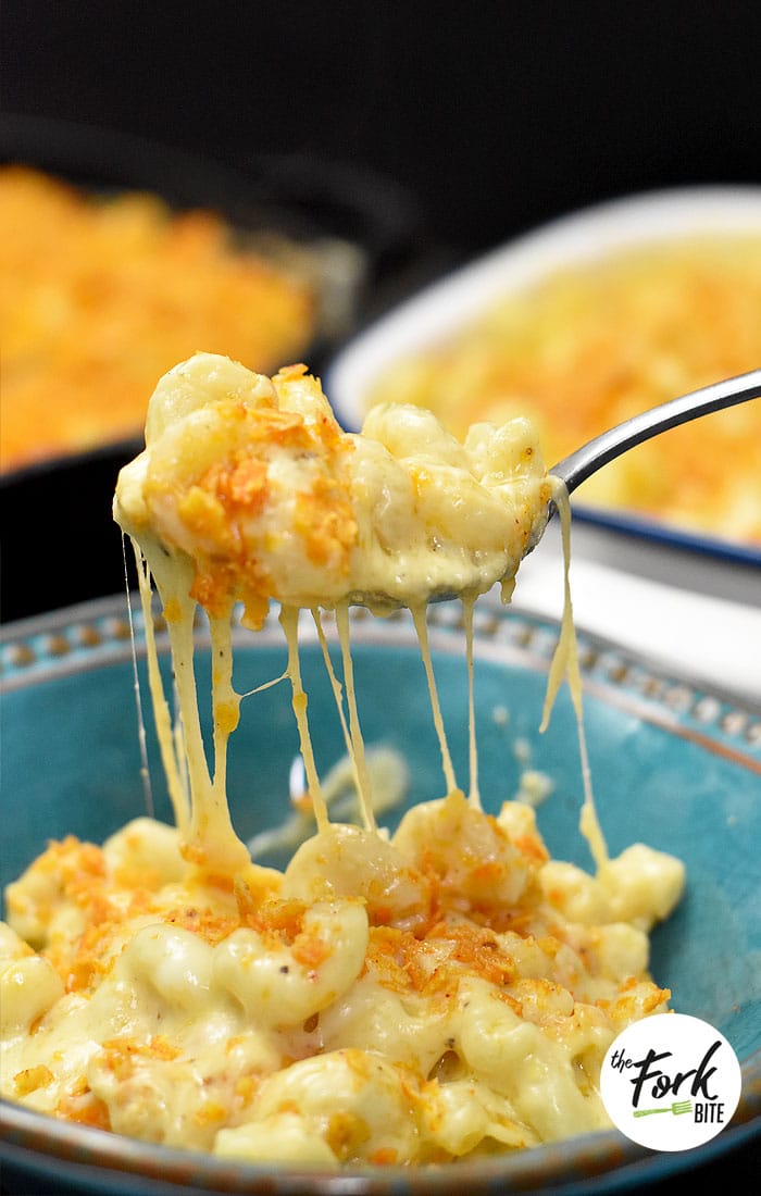 Creamy Baked Mac and Cheese - This is one of my family favorite recipes. It's so cheesy, creamy with tons of rich cheese sauce and topped with Doritos making it extra delicious!