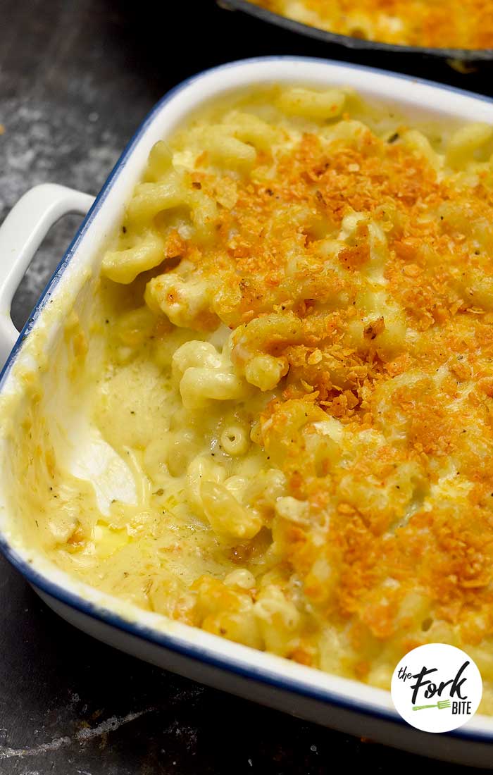 Creamy Baked Mac and Cheese - This is one of my family favorite recipes. It's so cheesy, creamy with tons of rich cheese sauce and topped with Doritos making it extra delicious!