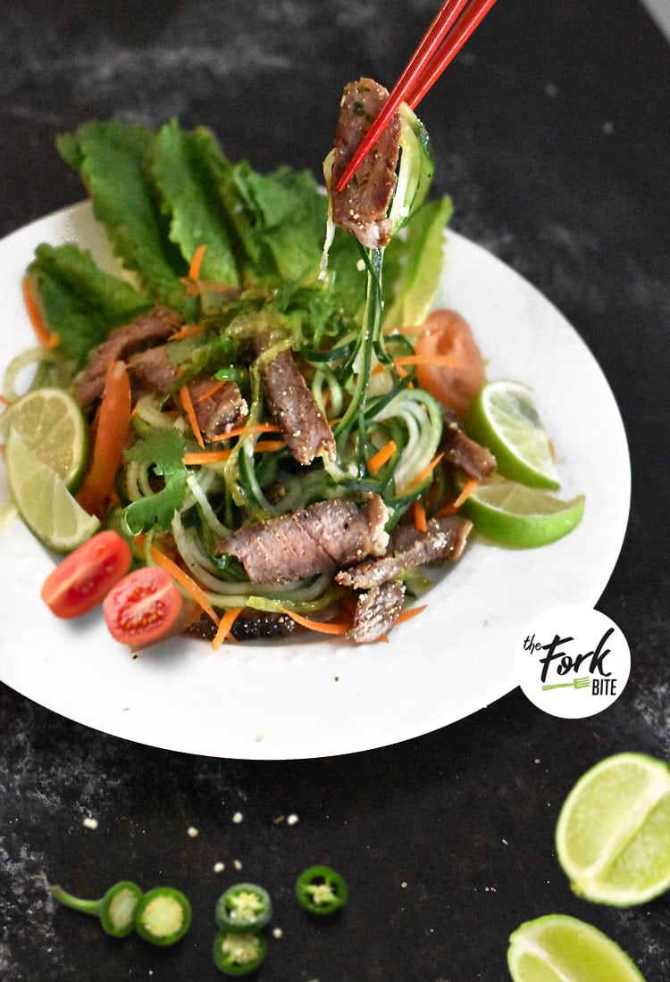 You will love this tangy dressing made for this Thai Beef Salad. It's amazingly delicious, full of strong flavors and topped with toasted rice powder for a bit of crunch