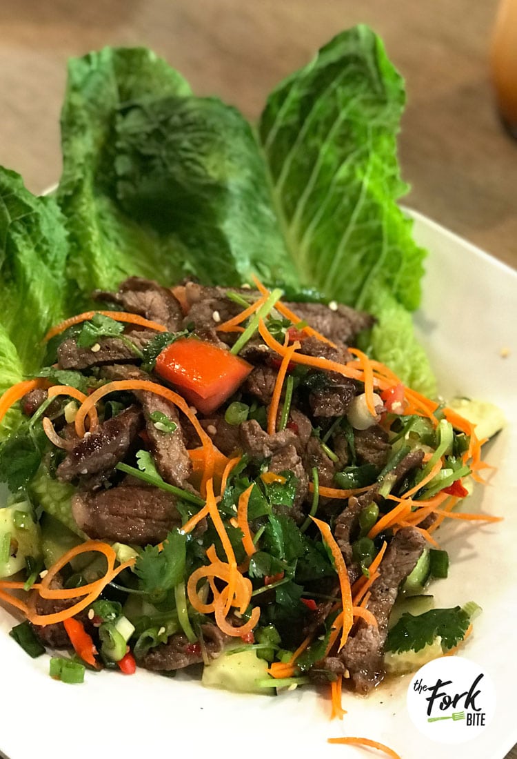 You will love this tangy dressing made for this Thai Beef Salad. It's amazingly delicious, full of strong flavors and topped with toasted rice powder for a bit of crunch