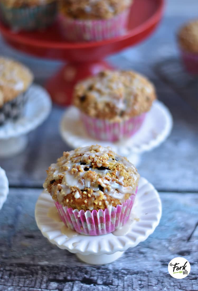 Muffins can be drizzled with a thin glaze or streusel toppings. For me, a muffin is small quick bread while a cupcake is a small cake.