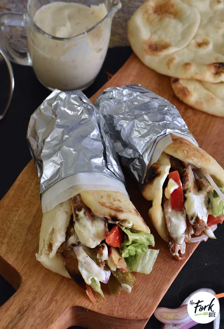 I love this chicken shawarma wrap. It's bursting with smoky flavor and wrap in your favorite flatbread like Naan or pita. Topped with chicken marinated in spices and roasted to perfection