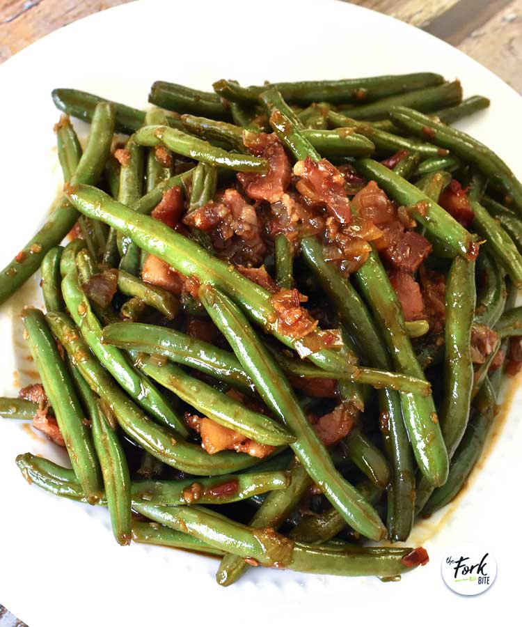 These crunchy green beans are loaded with savory, sweet and a bit spicy kick that makes this Stir Fry a tasty side dish and so great when eaten with lots of rice.