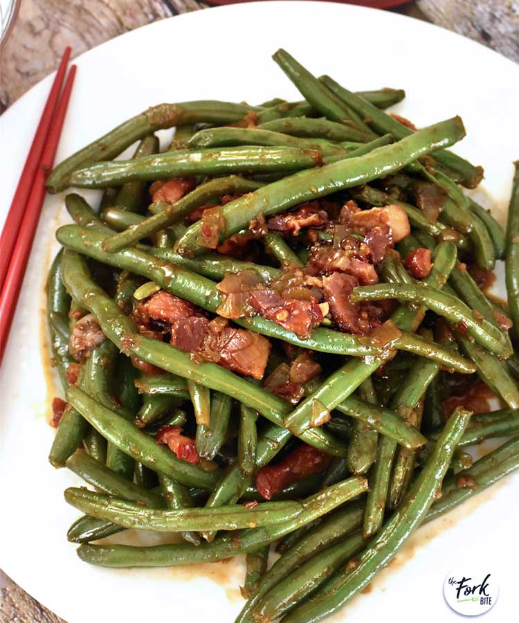 These crunchy green beans are loaded with savory, sweet and a bit spicy kick that makes this Stir Fry a tasty side dish and so great when eaten with lots of rice.