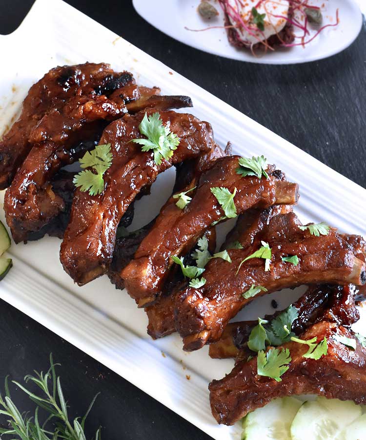 These are the sticky pork ribs that you could probably have every weekend. These Asian Pork Ribs are delicious and super easy recipe, which you could have on your own or serve to your family and friends in no time at all.