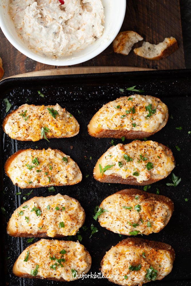 Super easy bite-sized crispy, baked Shrimp Toast topped with creamiest, cheesiest shrimp spread topping. Let these finger foods a life of your party.