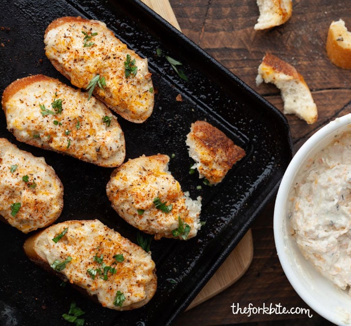 Super easy bite-sized crispy, baked Shrimp Toast topped with creamiest, cheesiest shrimp spread topping. Let these finger foods a life of your party.