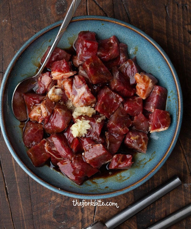 This Vietnamese Shaking Beef or Bo Luc Lac is super easy to make with a tender, flavorful taste of beef seared in a hot wok. Drizzling the greens in a light vinaigrette and top it with beef, the veggies wilt slightly and the beef juices and vinaigrette blend together into a tangy sauce that’s perfect over brown/white rice.