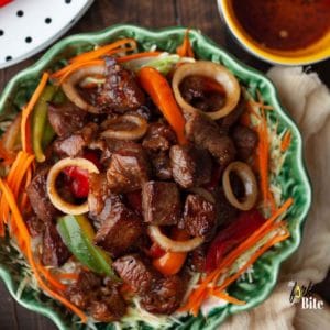 This Vietnamese Shaking Beef or Bo Luc Lac is super easy to make with a tender, flavorful taste of beef seared in a hot wok.