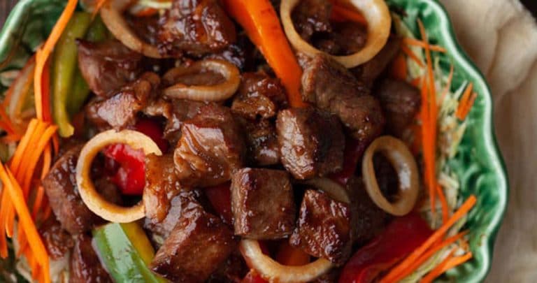 This Vietnamese Shaking Beef or Bo Luc Lac is super easy to make with a tender, flavorful taste of beef seared in a hot wok.