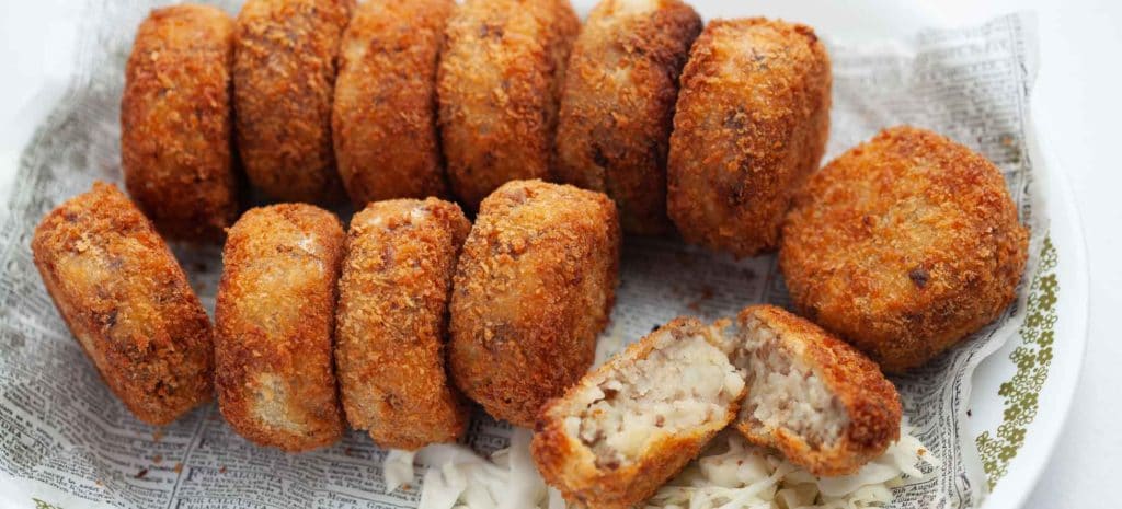 Japanese croquette recipe - patties of mashed potatoes and ground beef coated in panko.