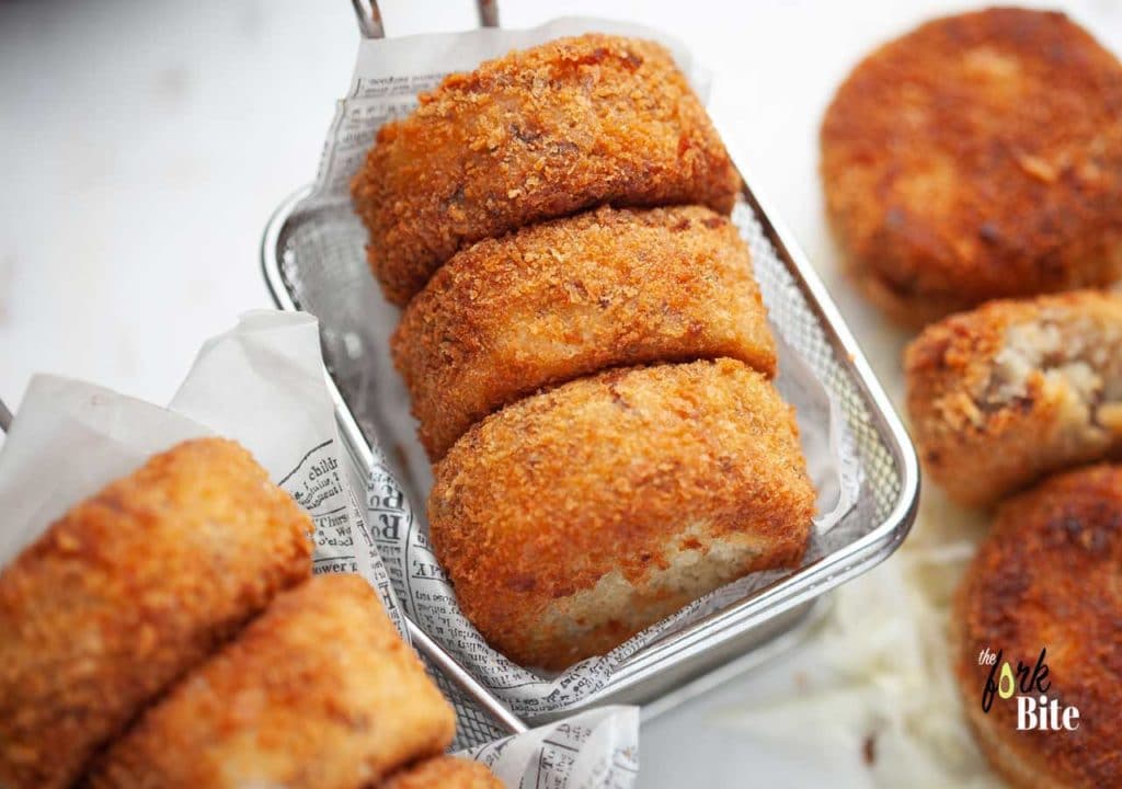Cook the crumbed croquettes for 4 minutes on each side or until golden.  Drain on a wire rack or on kitchen paper. Serve the croquettes with the tonkatsu sauce and cabbage, tomato, or a salad.