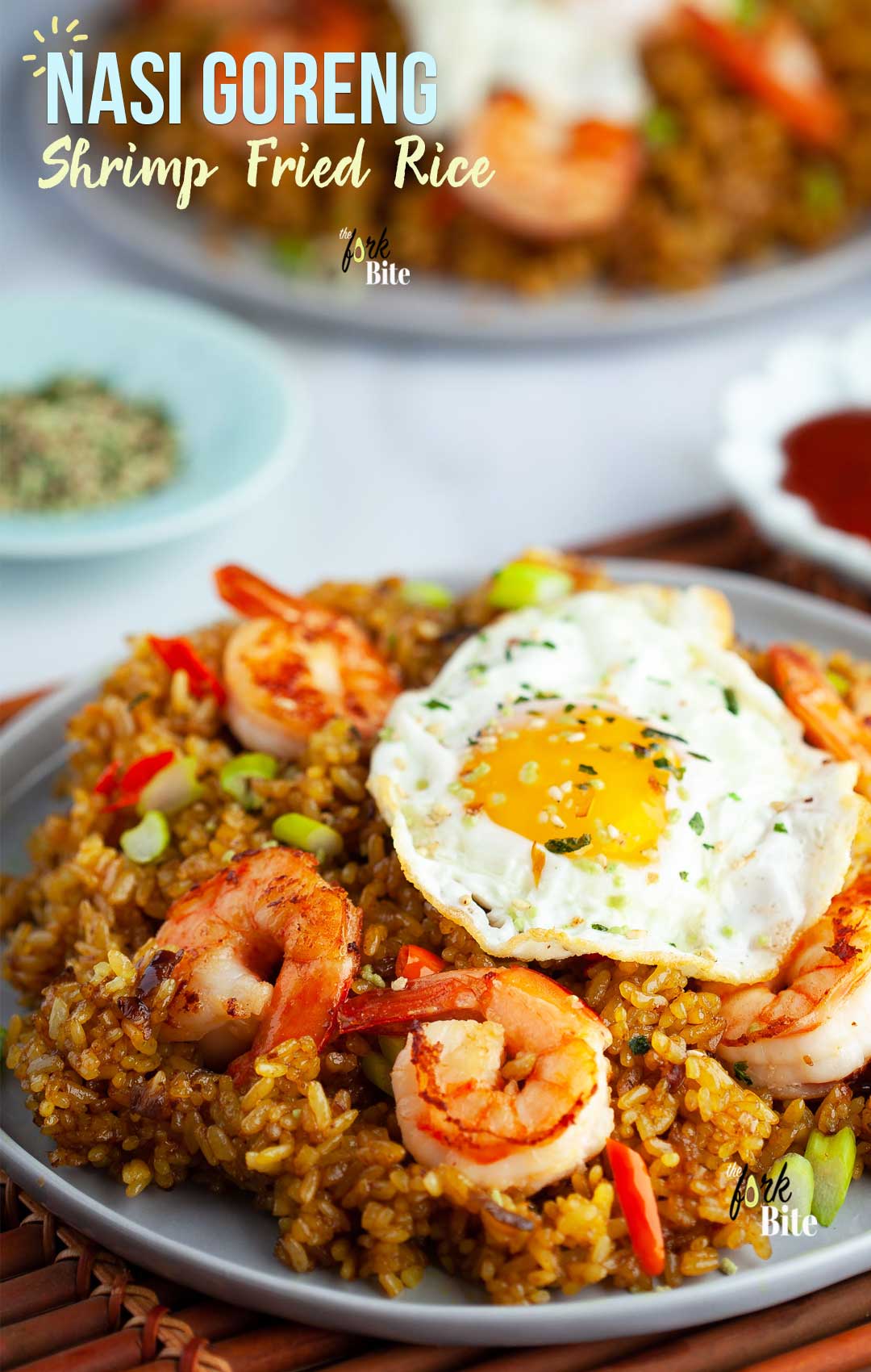 This Nasi Goreng or Indonesian fried rice with shrimp is one of my favorite fried rice recipes that packs a punch of sweet, spicy and savory flavors your family will love. Great use for leftover rice and ready in 15 minutes.