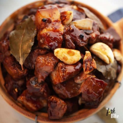 Pork Adobo Instant Pot is fork-tender meat that melts in your mouth with a perfect balance of acidity and garlicky flavors. Super easy to make your family will love.