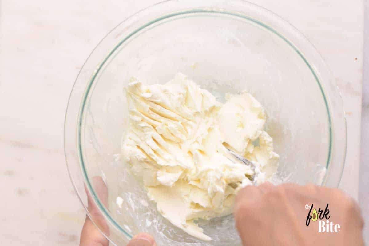 Let the cream cheese sit outside the fridge to achieve that soft room temperature texture. It’s easier to mash into smaller pieces when it’s soft and creamy.