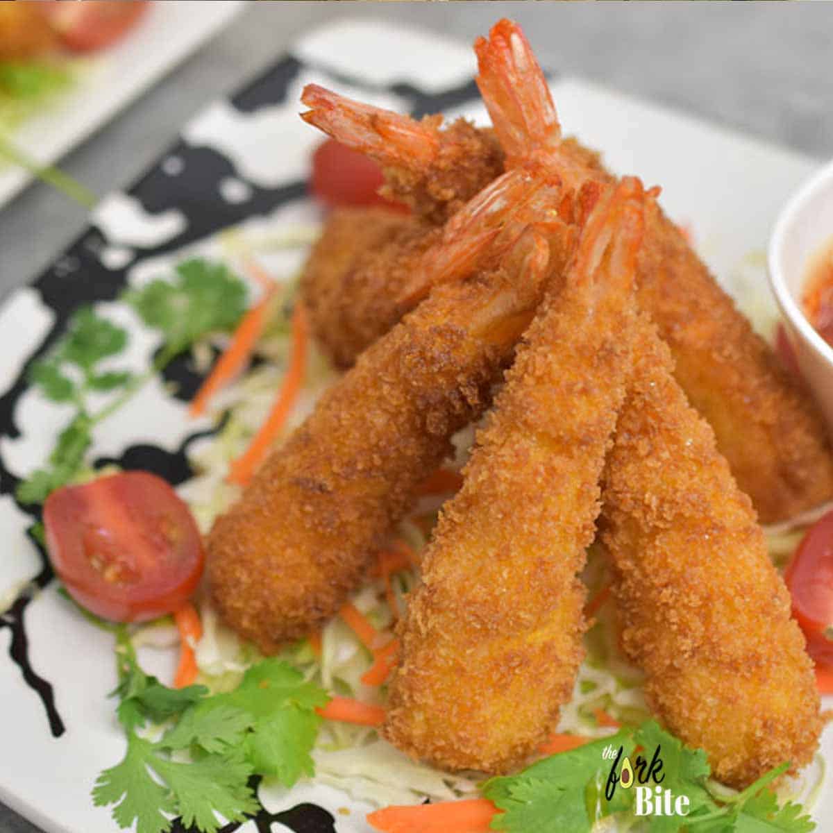 This crispy Fried Japanese Shrimp Tempura is best served as a first course, appetizer or even as a main dish. Dip it in this flavorful tartar sauce. Does your shrimp curl up almost immediately after hitting the hot oil? Learn the trick.