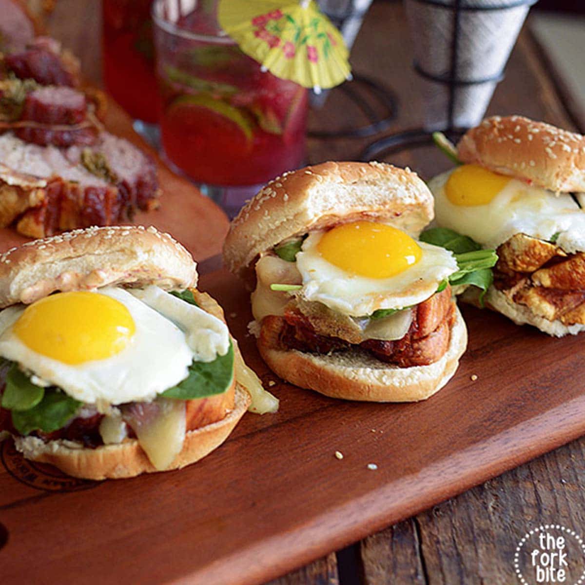 This roasted porchetta egg sandwich is the ultimate breakfast or brunch with flavorful porchetta, melted cheese, and a gooey fried egg on a bun or bagel.