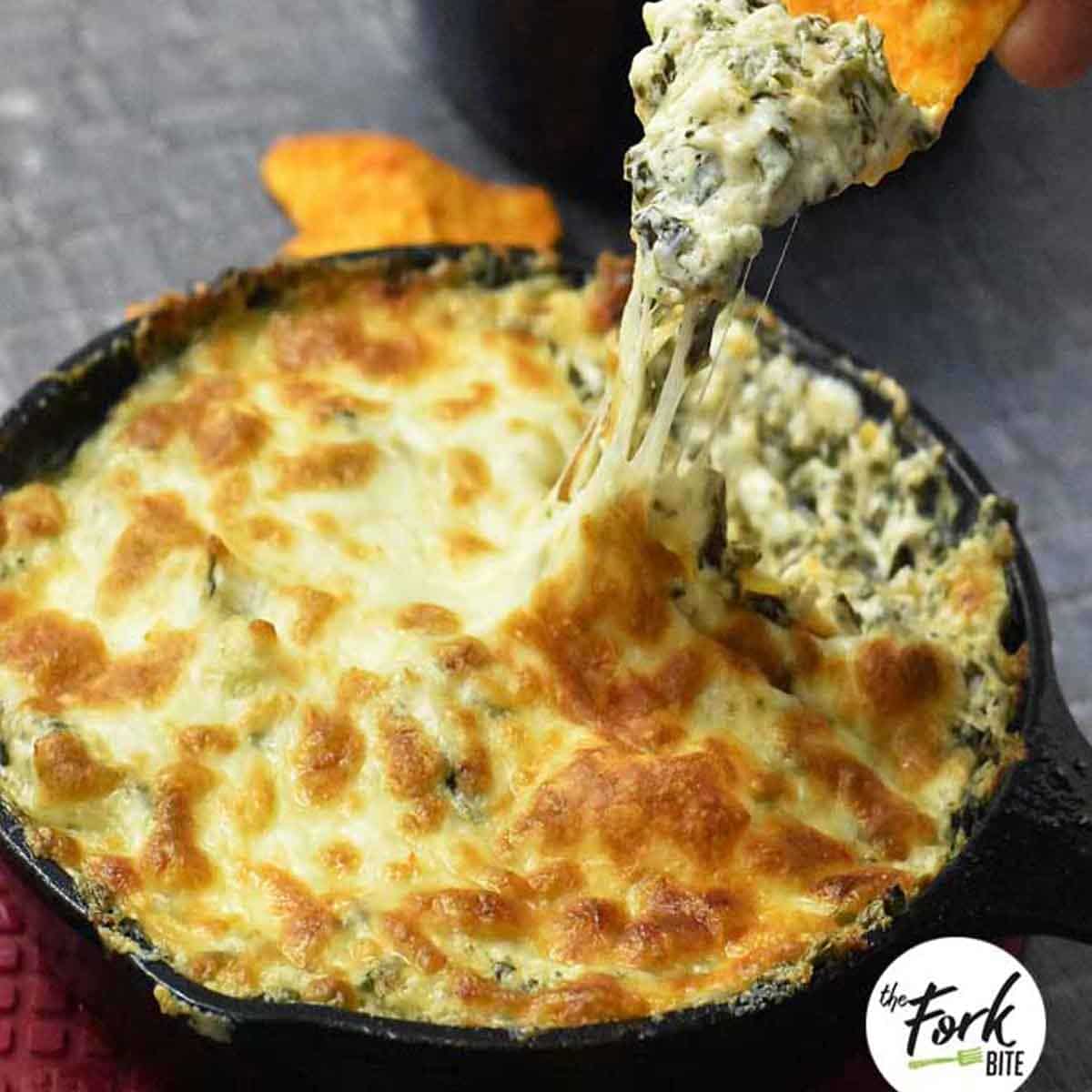 This sumptuous spinach artichoke dish is one of those yummy recipes that you can start in the morning and munch on all day or whip it up early and forget it while you get all other dishes ready for any party or get-together.