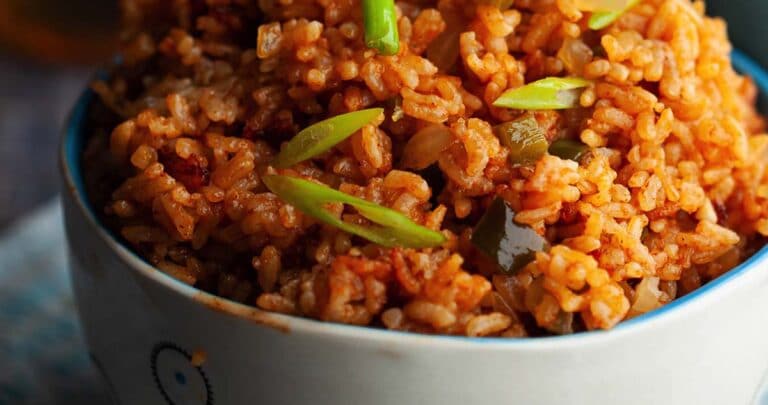 Here’s the right way to make Arroz Rojo in your kitchen. The rice is not only soft and fluffy but is not sticky and has the perfect chew.