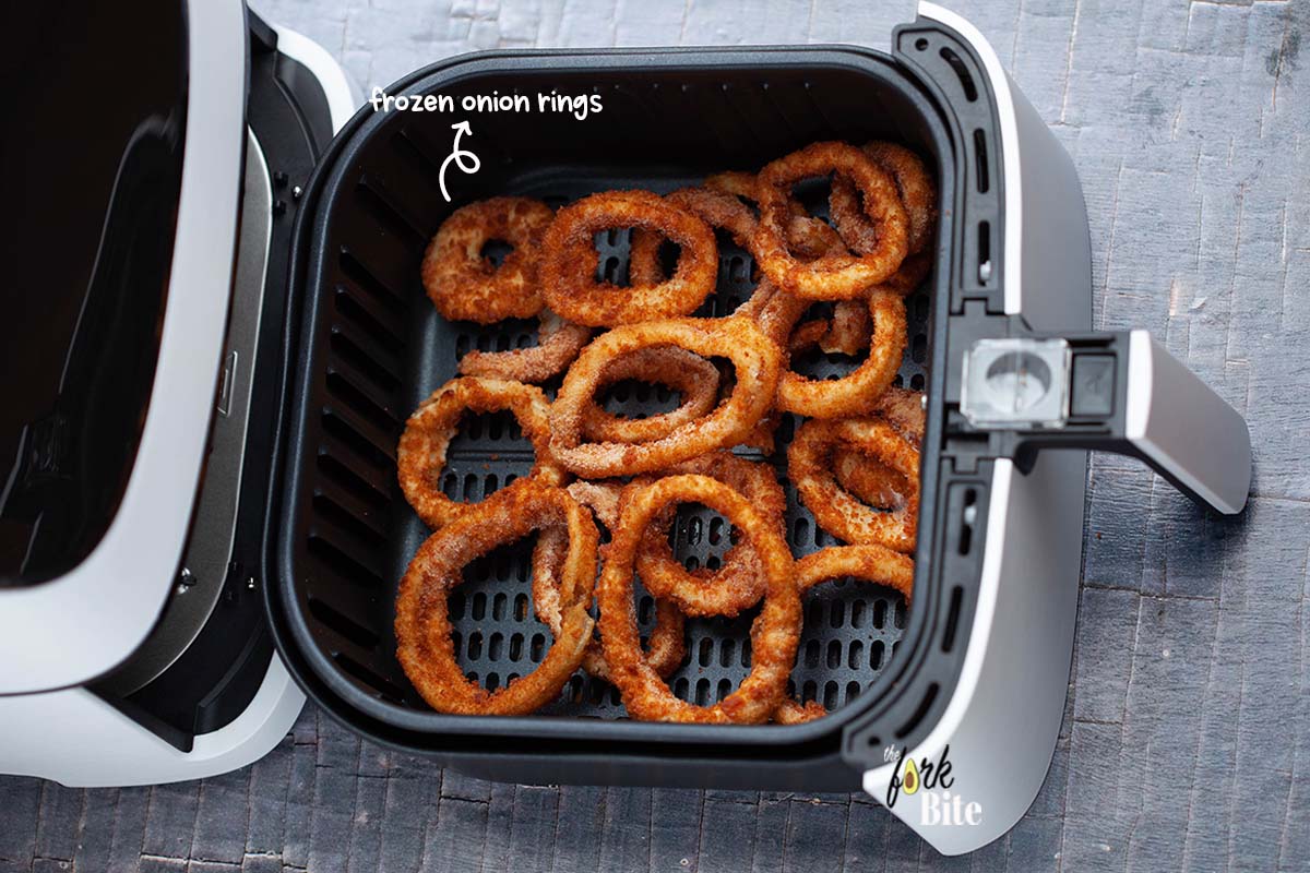 Preheat your air fryer to 350°F. When it's up to temperature, put the leftover onion rings inside and cook for approximately 2 to 3 minutes or until they're warmed through.