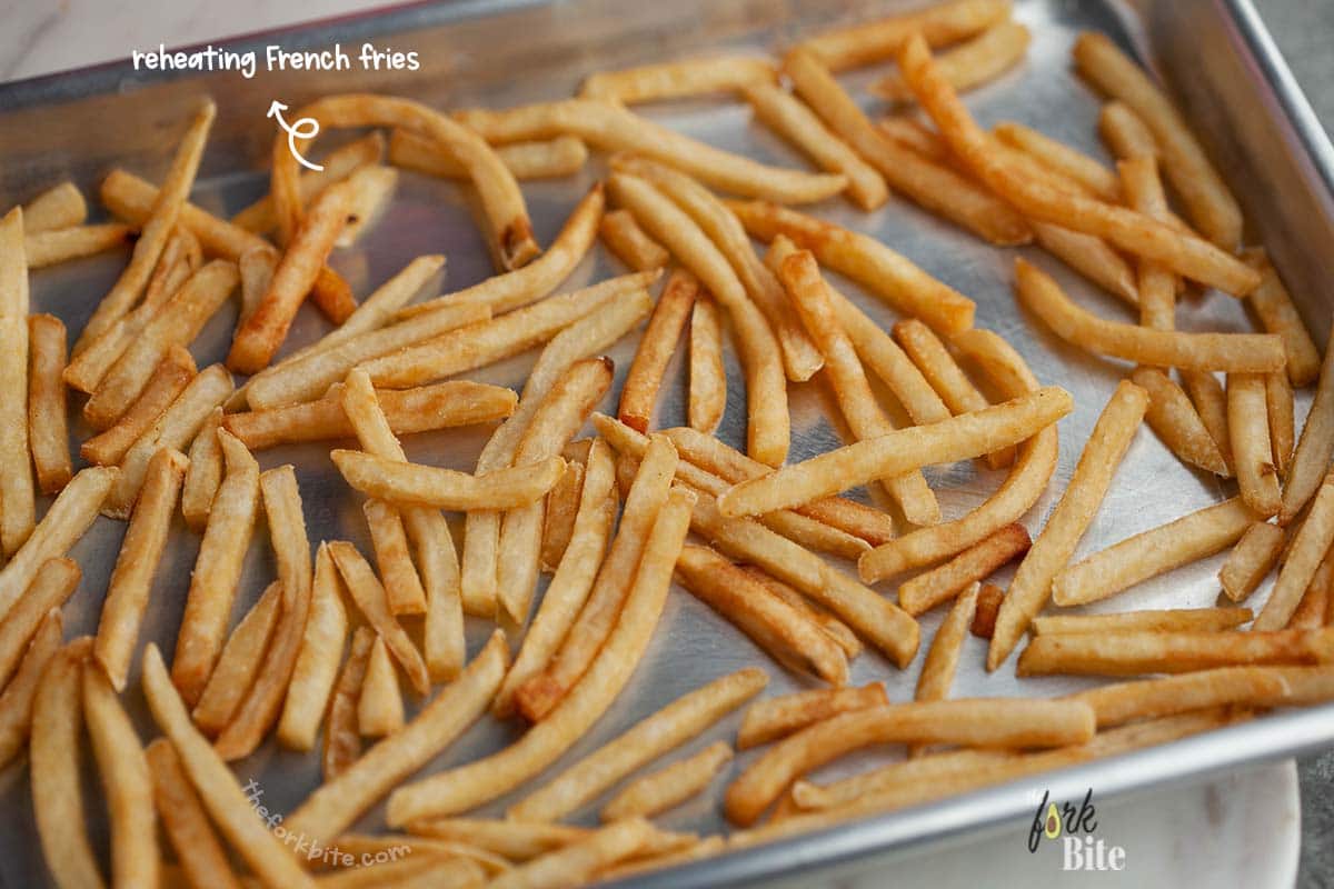 If you’ve got a lot of fries to reheat, a large baking tray is a better option because you don’t want to have fries on top of fries – just one, well-spaced layer.