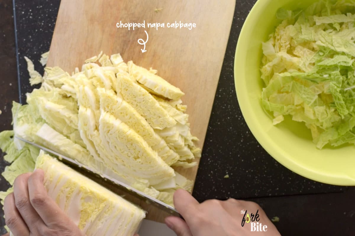 Chop the napa cabbage. Follow the next step carefully, or your uncooked potstickers will be soggy and will tear as cabbage releases its water content when it cooks.