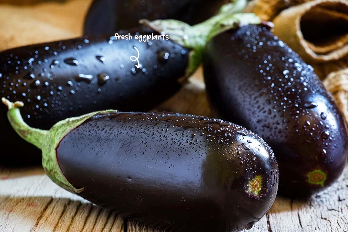 The best way to test an eggplant’s readiness is gently placing it in the palm of your hand and giving it a gentle squeeze with your thumb.