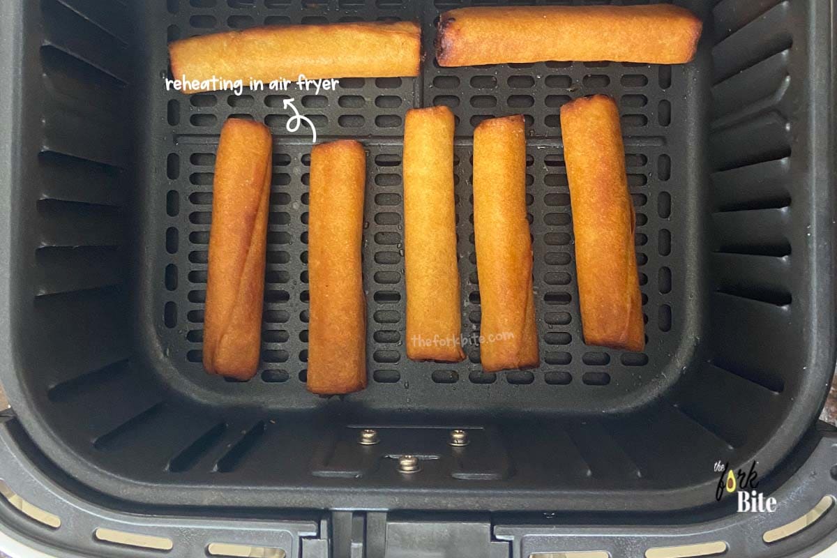 You should not put frozen egg rolls into your air fryer because doing so will just burn the egg rolls on the outside before the inside even defrosts and heated up.