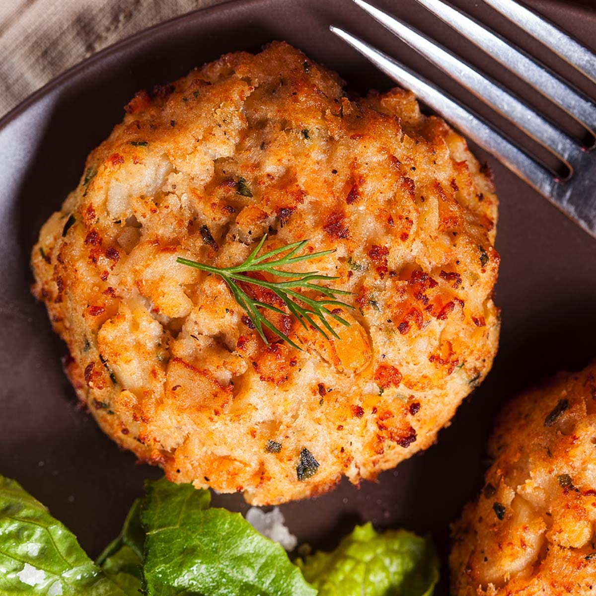 When you freeze crab cakes, the freezing process prevents bacterial growth and keeps the produce fresh for many months after you prepare them.