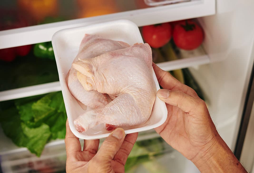 Uncooked chicken and other meats, for that matter, can be kept safely in a refrigerator for up to two days. Any longer than that, and it ought to be thrown it away.