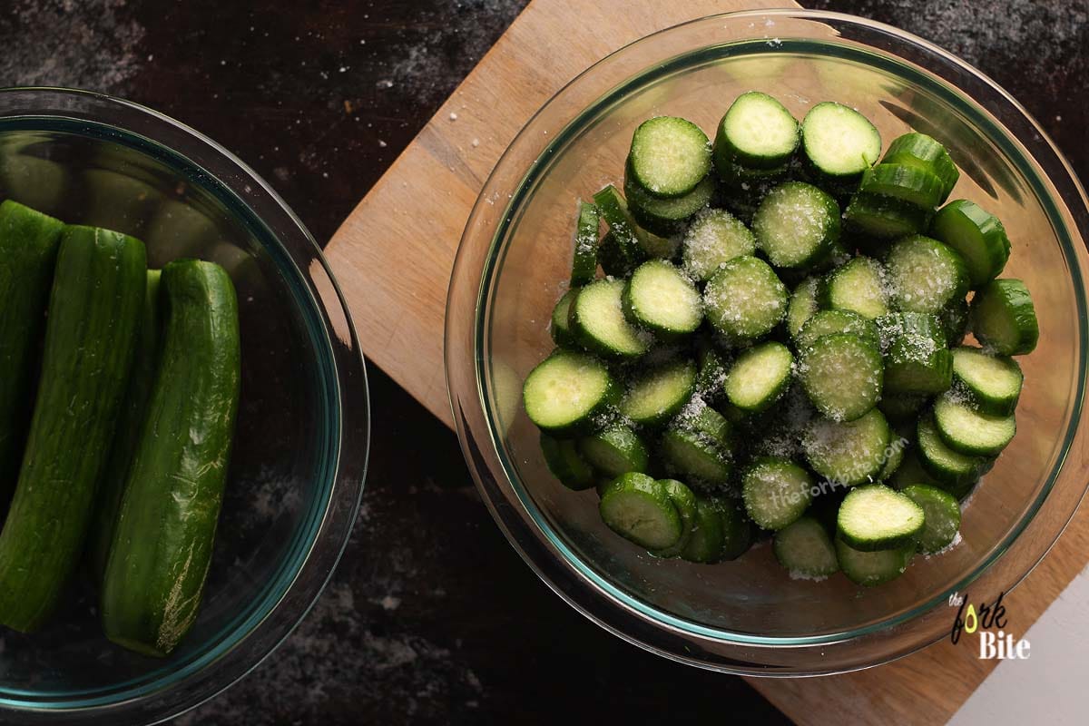 Slice the cucumber into ½ inch thick rounds and put into a small bowl. Lightly sprinkle with Kosher salt and toss them well. Put them in the fridge and allow to sit there for between 45 and 60 minutes.