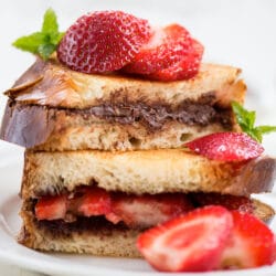 French toast nutella is slightly browned and crispy on the outside and soft on the inside, it comes complete with a rich, robust, custard-based flavoring and sweetened with various sugars.
