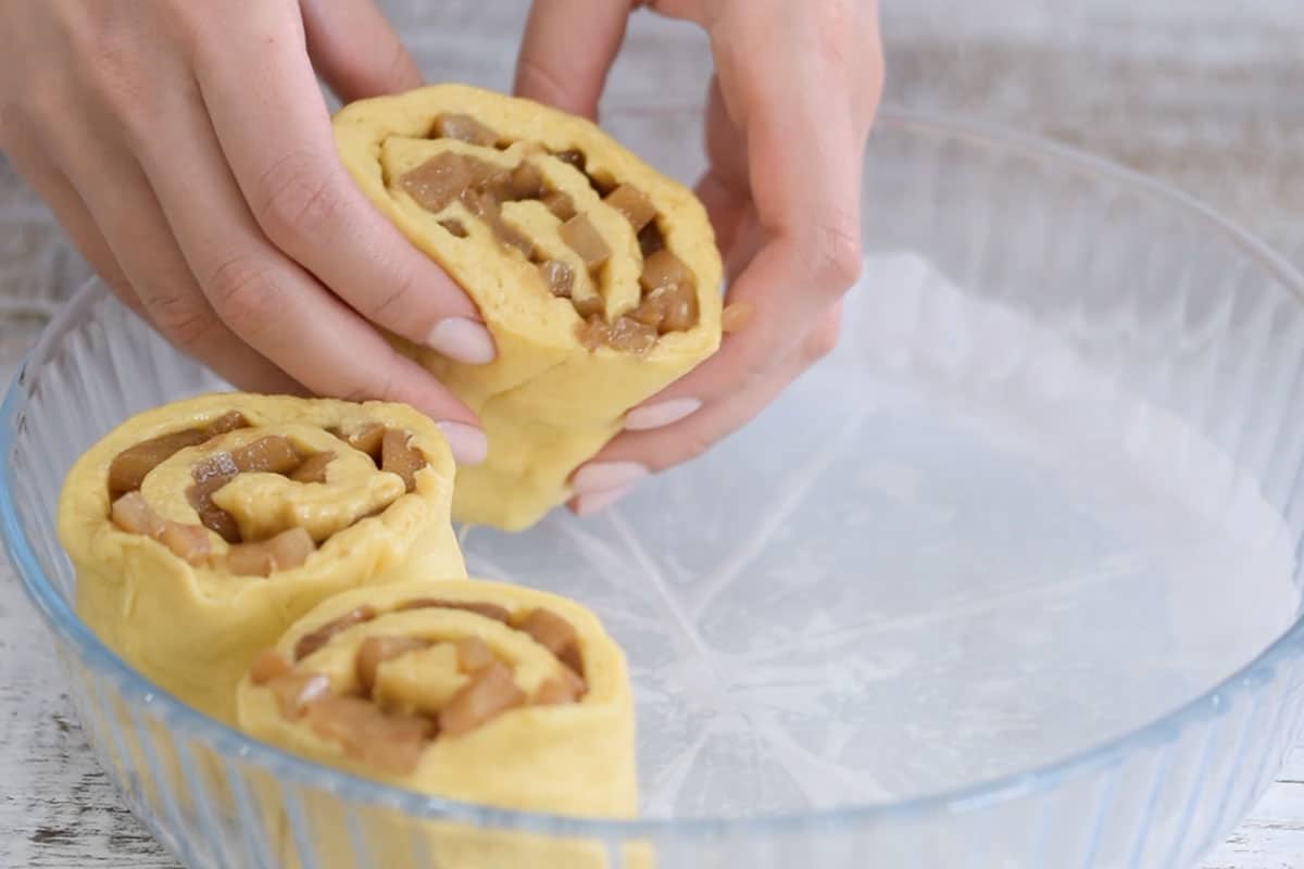 Slice the roll into approximately 1½ inch thick slices, producing about 12 roles in all.